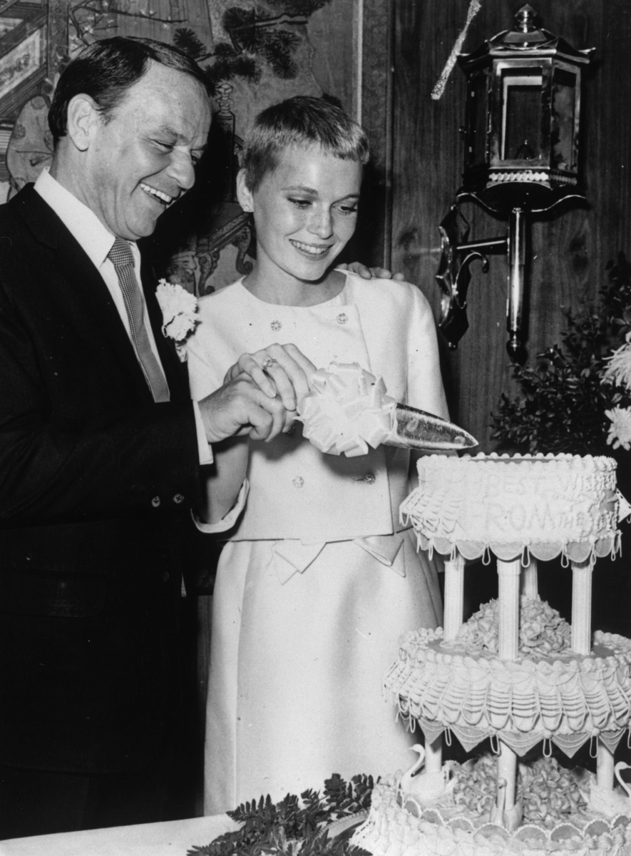 After growing discontent at Capitol Records, Sinatra went on to form his own label, Reprise Records, aand releasing his first album in 1961. After a few broken engagements with Lauren Ball and Juliet Prowse in 1962, Sinatra finally went on to marry Mia Farrow in July 1966. The smiling couple is seen here cutting their wedding cake during their Las Vegas wedding. Their marriage didn't even hit the two-year mark before they filed for divorce. Despite parting ways, however, the two remained close friends for life.
