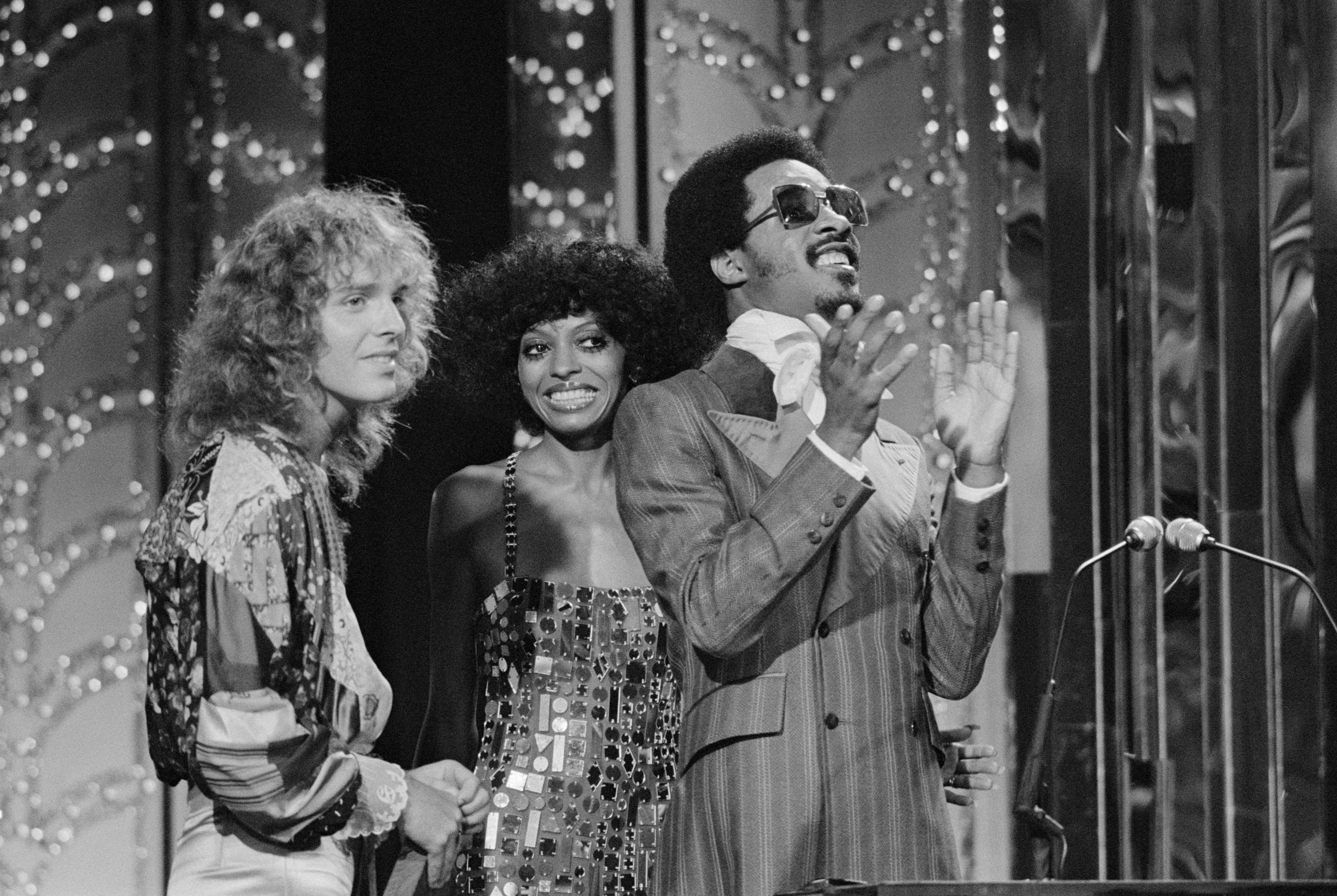 Peter Frampton, left, Diana Ross and Stevie Wonder on the 2nd annual Rock Music Awards on Sept. 18, 1976.