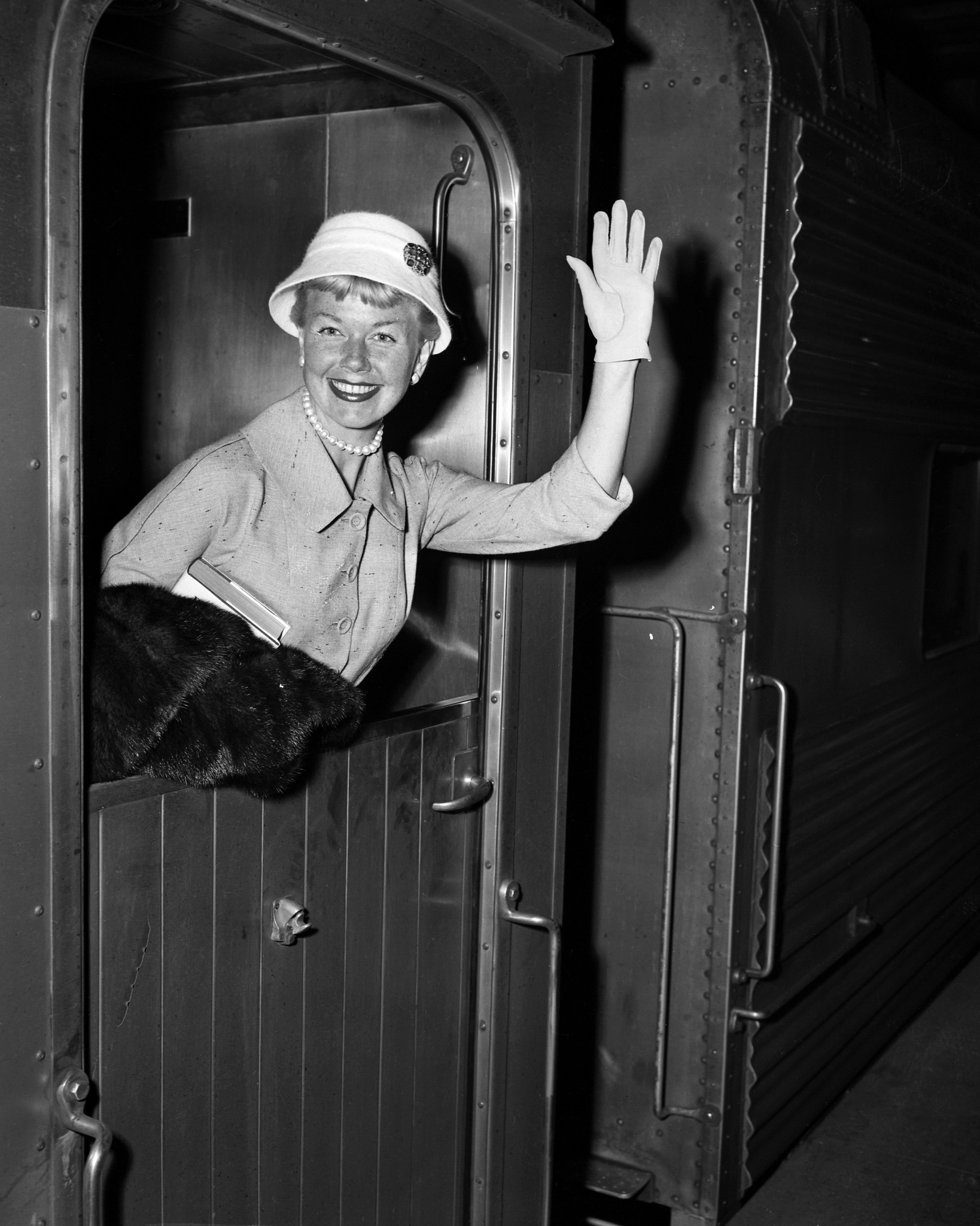 Doris Day smiles as she arrives at Grand Central Terminal on Sept. 8, 1957, in New York. The star of 