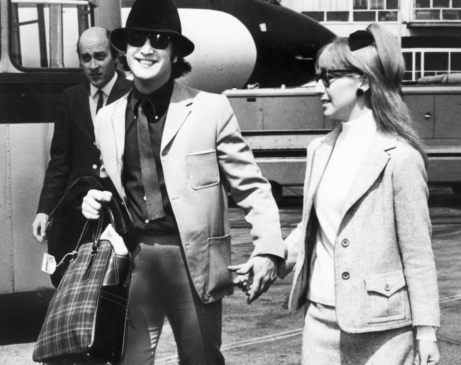 John Lennon and his first wife Cynthia Powell are spotted here en route to Cannes from London back in 1965. The two divorced in 1968, paving the way for Lennon's relationship with Yoko Ono.