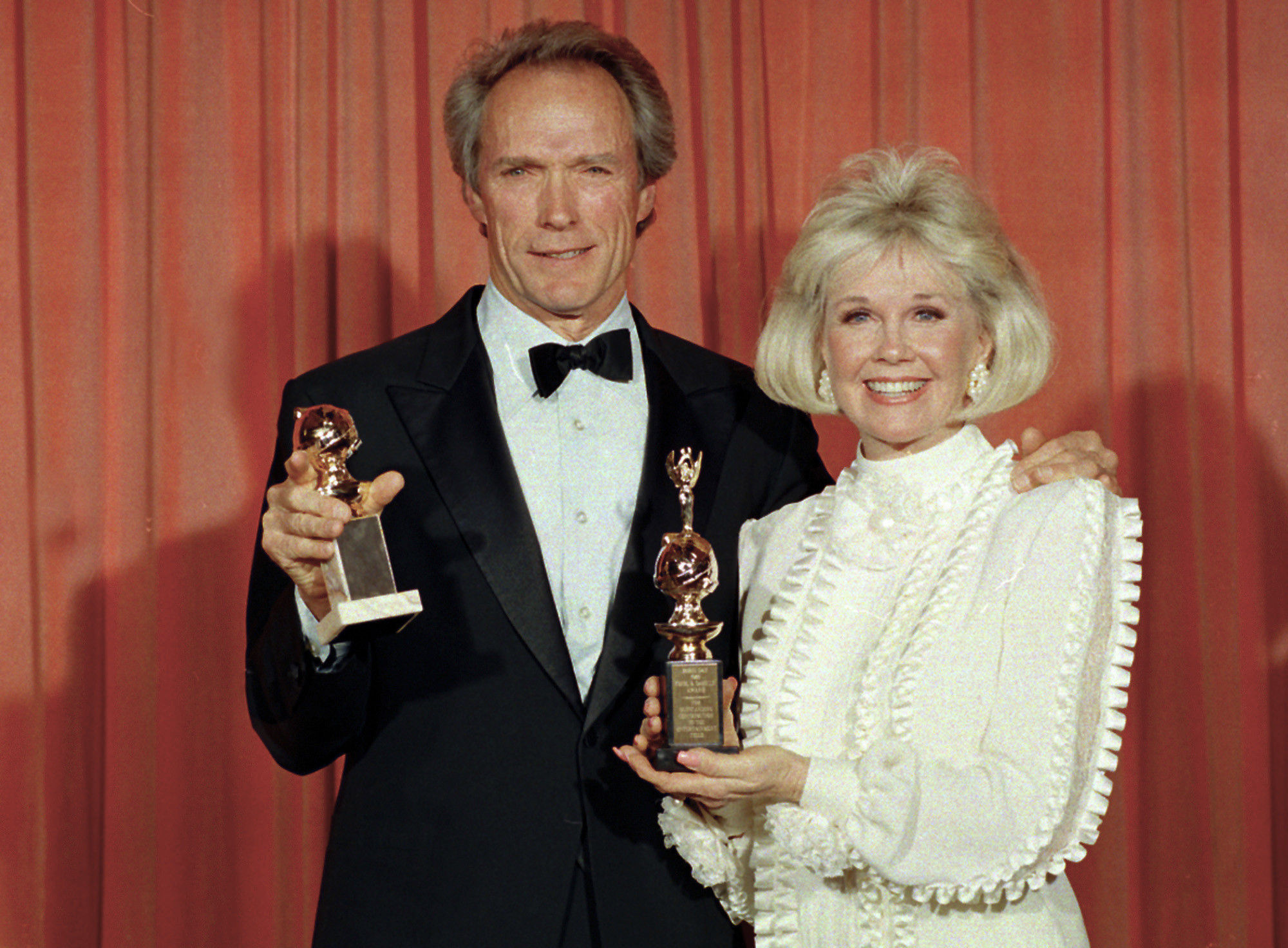 Clint Eastwood and Doris Day at the 46th Annual Golden Globe Awards on Jan. 29, 1989, in Beverly Hills, Calif. Day was honored with the Cecil B. DeMille Award for her outstanding contribution to the film industry and Eastwood won a Golden Globe for motion picture directing for his work on 