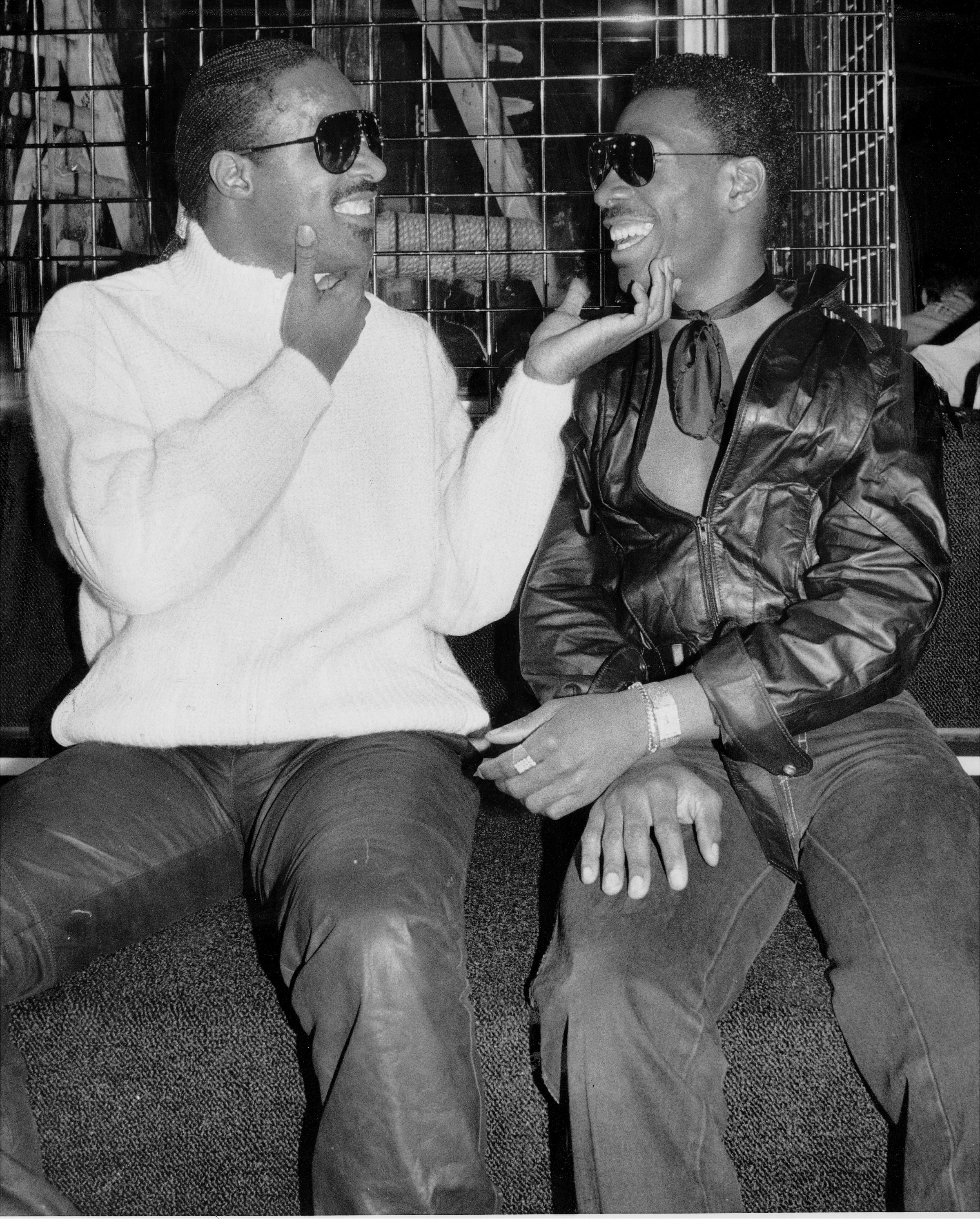 Stevie Wonder and Eddie Murphy celebrate at party at the Red Parrot after Wonder's Radio City concert.